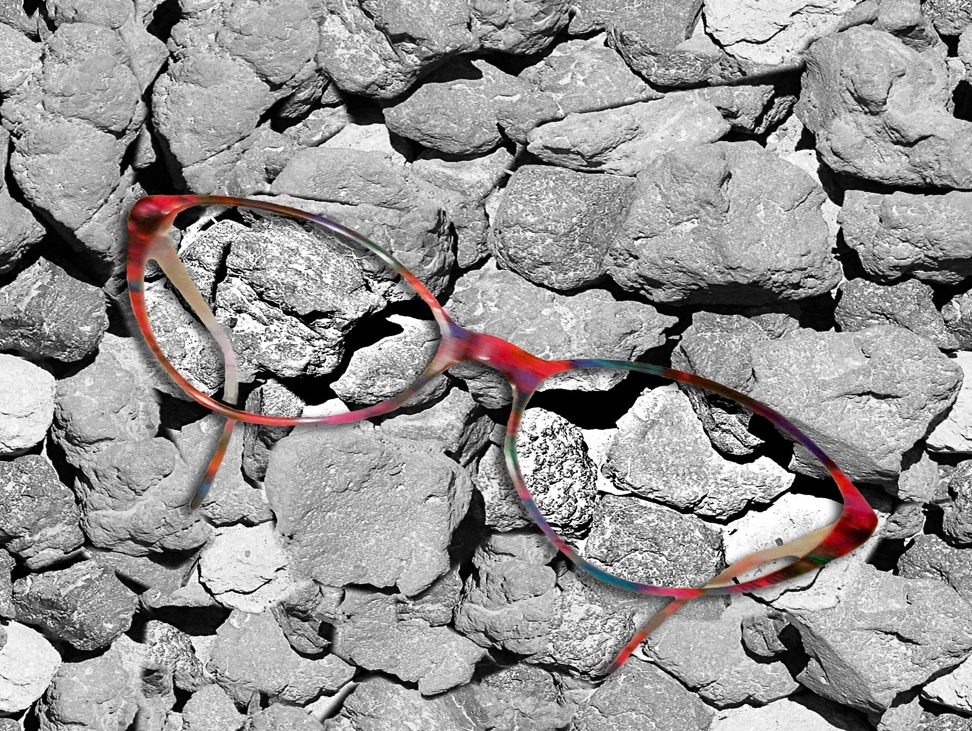 multi color glasses on rocks