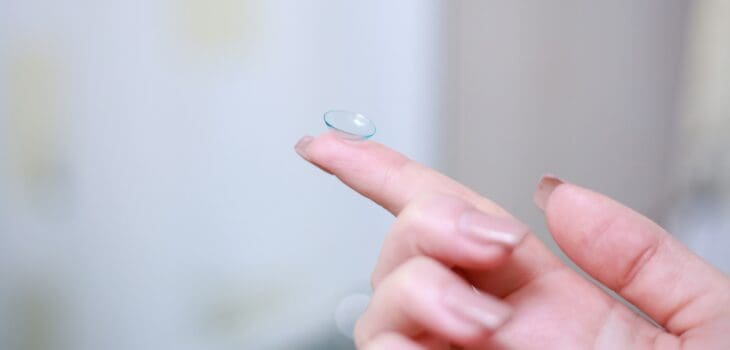 Contact lens on a finger tip